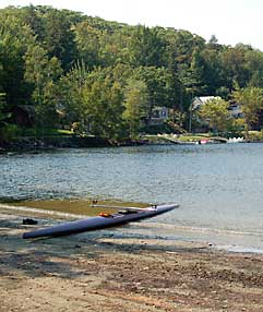 Beached kayak on Barrett's Cove Megunticook Lake